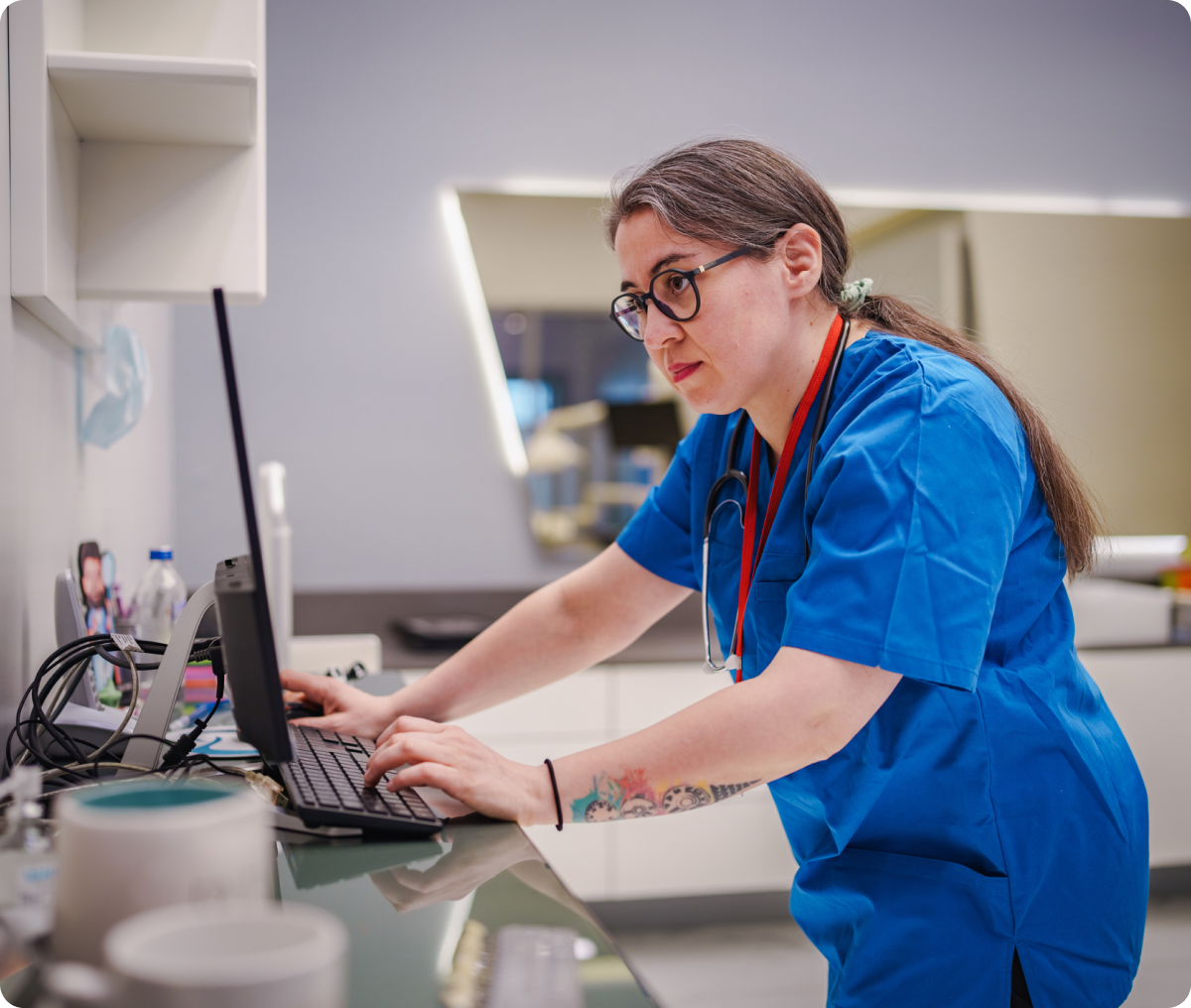 Healthcare worker in blue scrubs